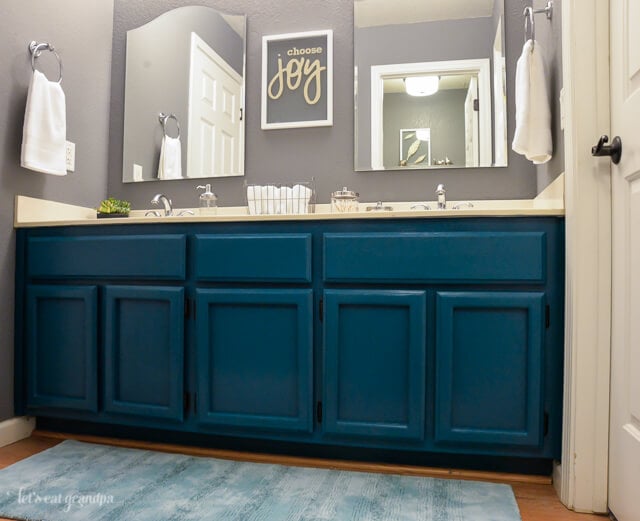 Our gray and teal guest bathroom makeover -- from boring beige to cozy modern!