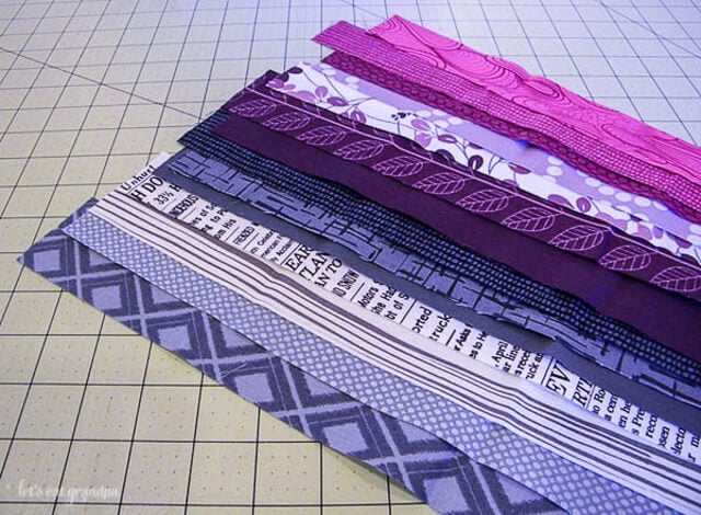 fabric strips on cutting mat