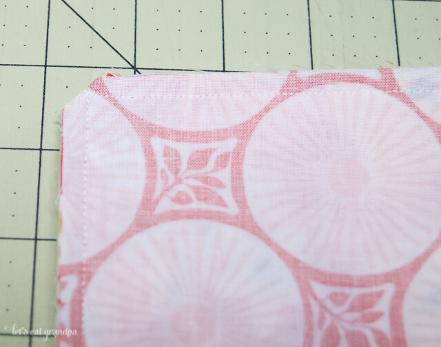 Trimmed corners of Fabric on cutting mat