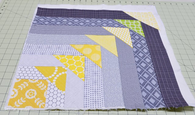 close up of in progress North West Quilt-As-You-Go Panel on cutting mat