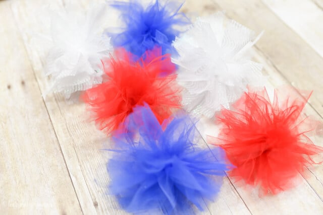 red, white, and blue firework poofs from tulle