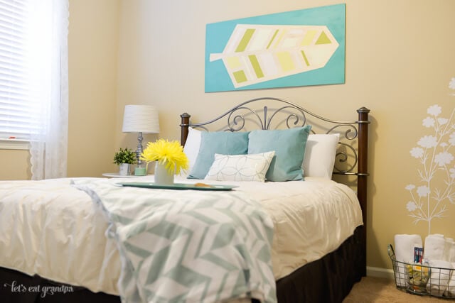 pretty bed in guest room makeover