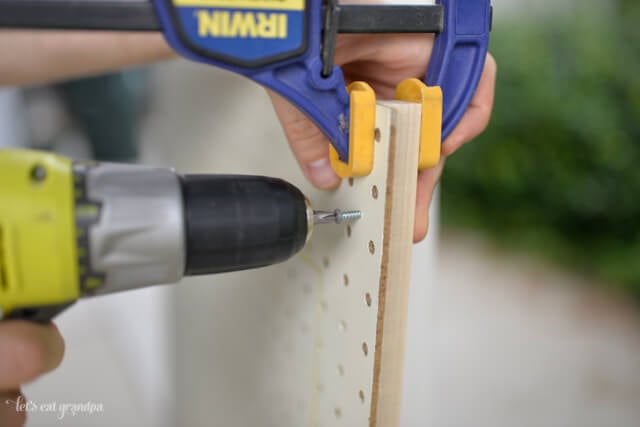 drilling screws in pegboard to mount