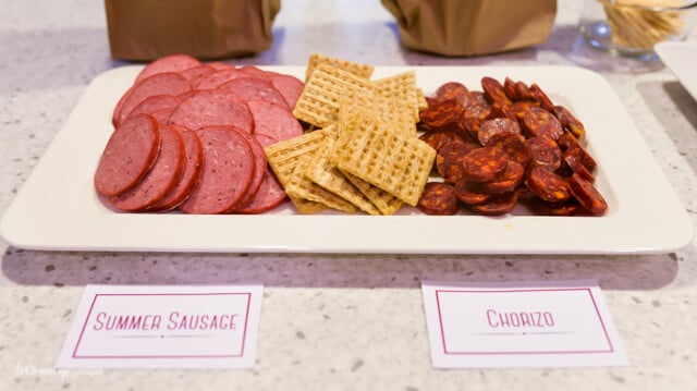 tray of meats and crackers on counter for wine party
