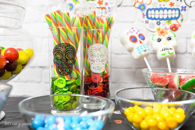 close up of vases and bowls for Dia de los Muertos Party Candy Bar