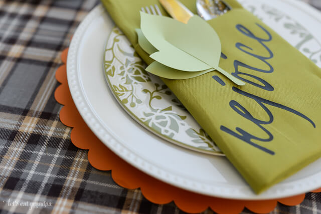 paper leaf on Thanksgiving napkin place setting